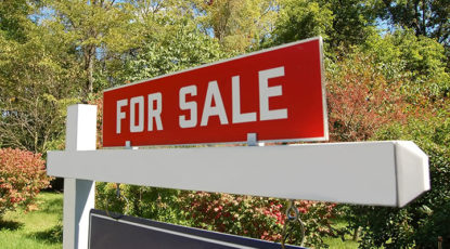 for sign outside of home for sale by the jeff lottmann group