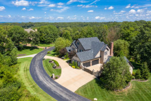 aerial of front exterior of home for sale in clayton