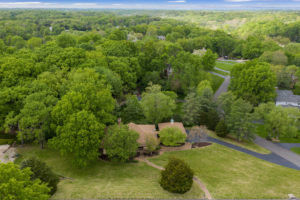 aerial of luxury home for sale by the jeff lottmann group