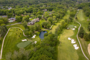 aerial of golf course property for sale by the jeff lottmann group