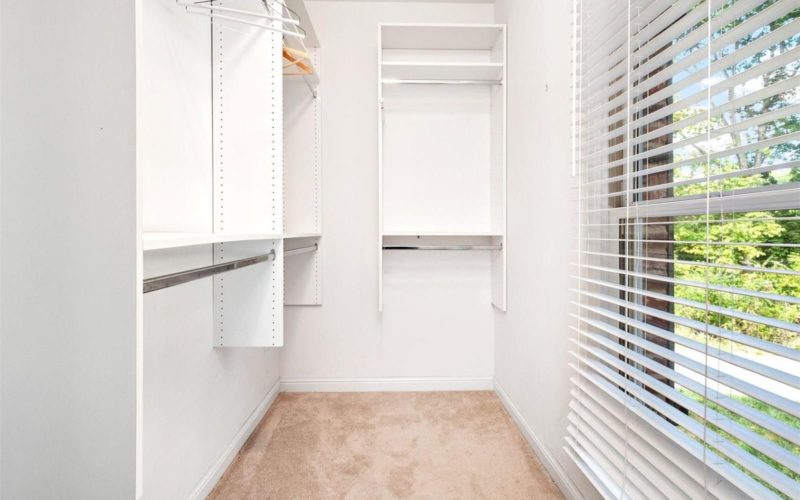 inside closet of home for sale by the jeff lottmann group