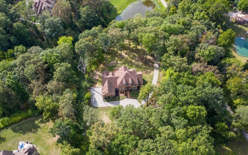 aerial of home for sale by the jeff lottmann group